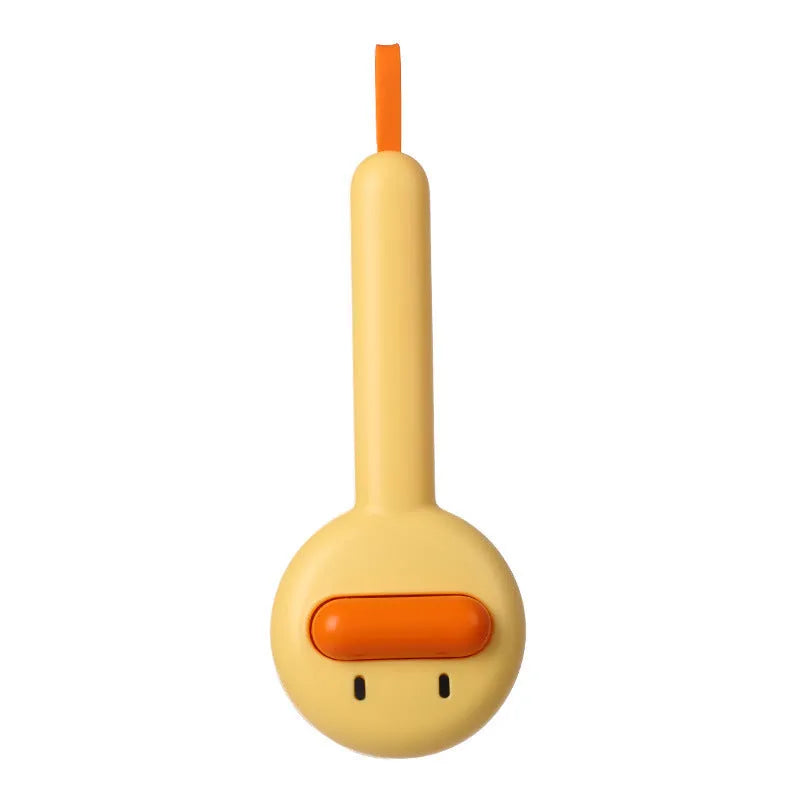 Small yellow duck-shaped pet grooming comb with needle teeth for cats and dogs