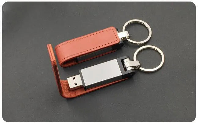 Leather USB flash drive with keychain ring, USB 2.0 interface, available in black, blue, brown, red, white, 16GB or 32GB