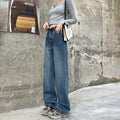 Women's retro blue high-waist straight-leg jeans on a neutral background.