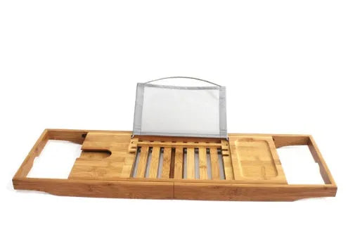 Bamboo bathtub frame shelf installed across tub edge for bathroom storage