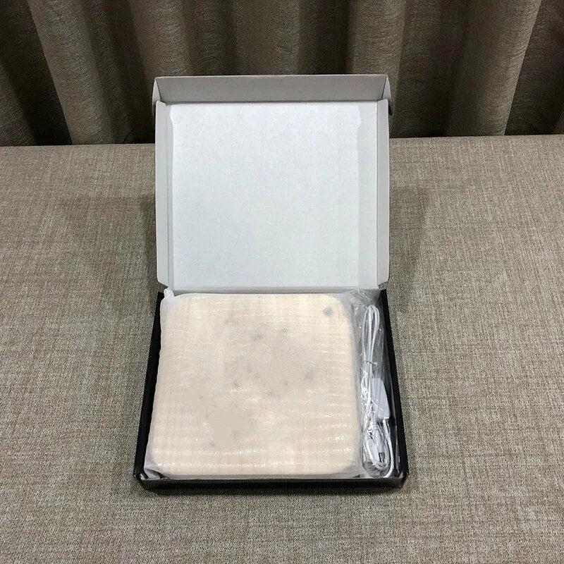 Square pine wood LED atmosphere lamp with warm white 3D illumination showing USB cable connection