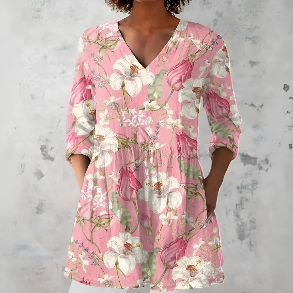 Women's retro-style slim fit long-sleeved top with a digital print pattern, shown on a hanger.
