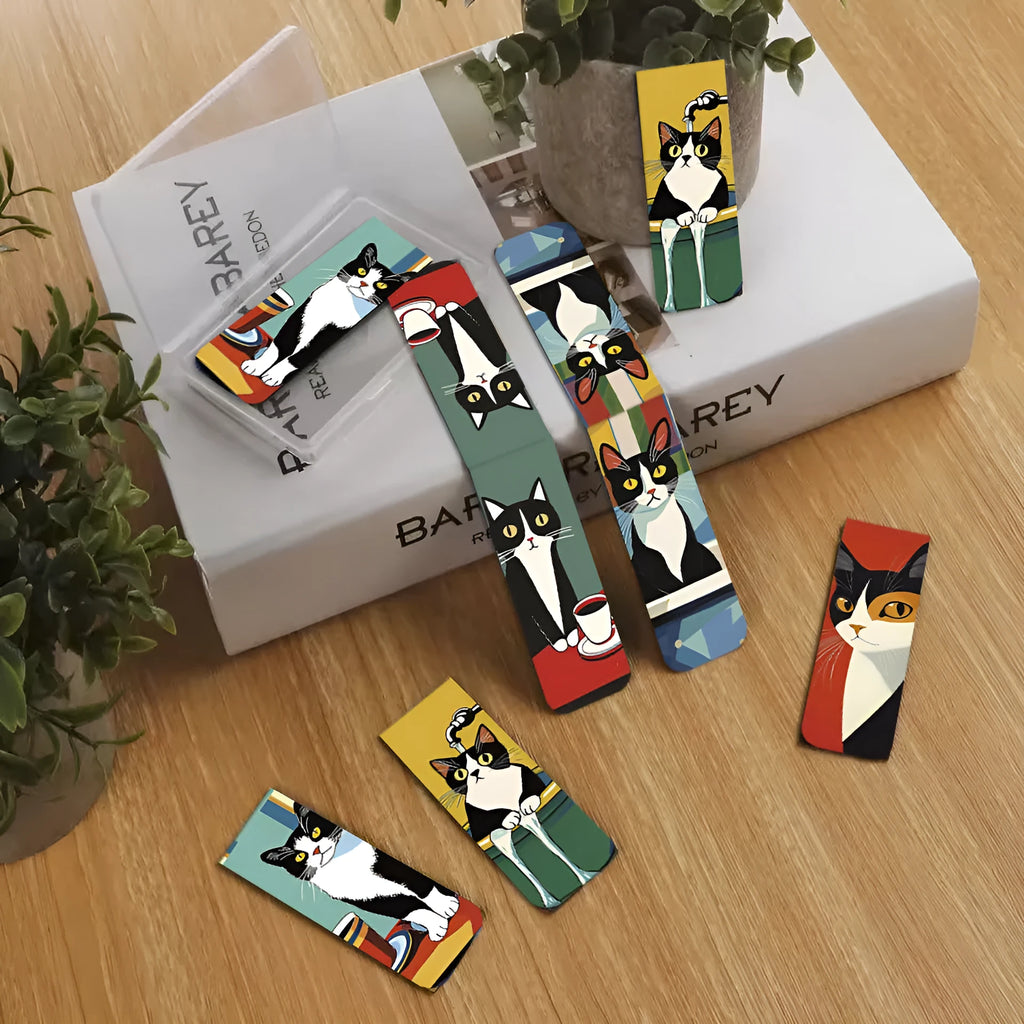 Set of 5 magnetic bookmarks with simple cute cat designs on a book page