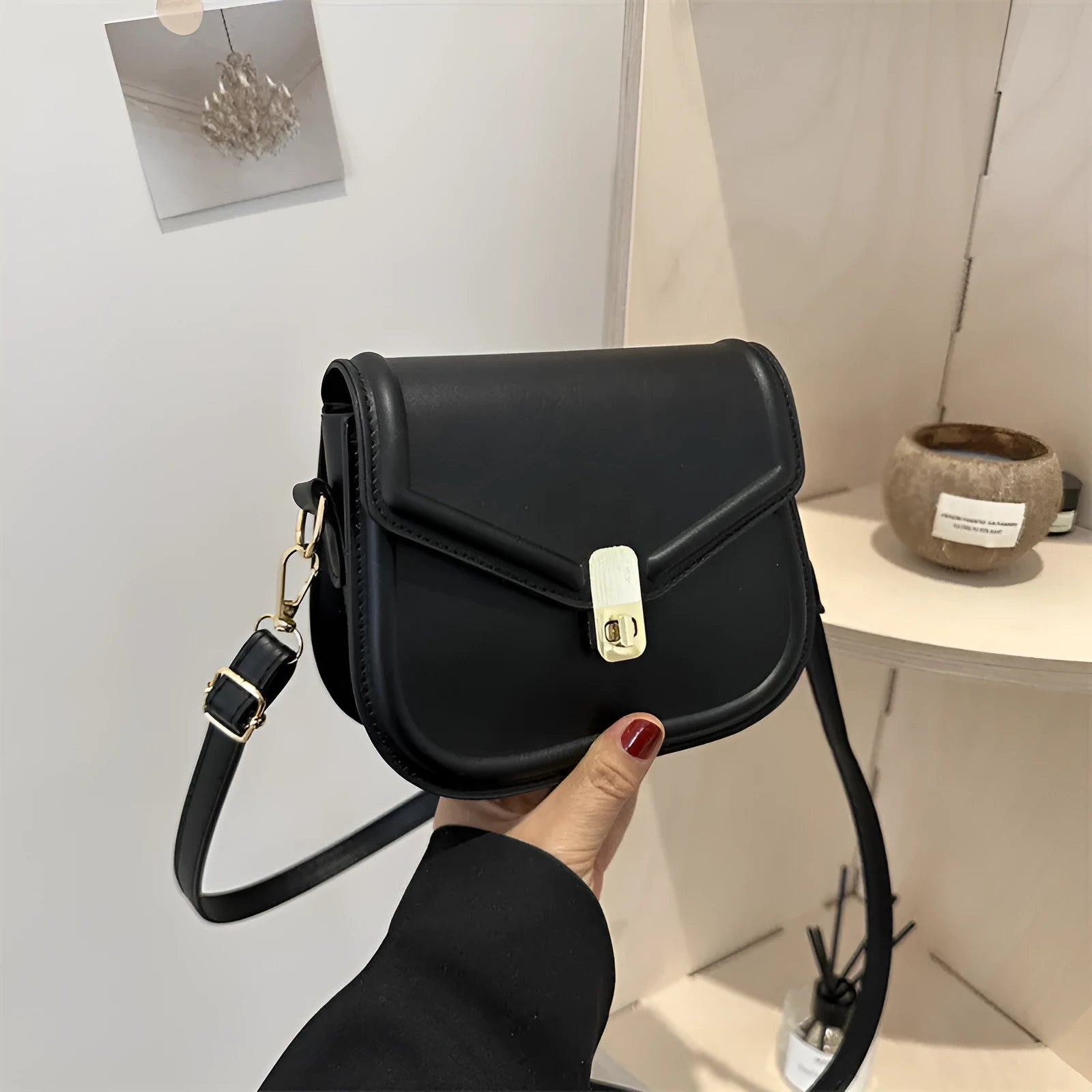 Niche texture shoulder messenger bag in soft PU leather with clamshell opening and horizontal square shape
