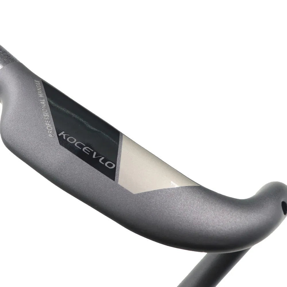 Wei Bike matt carbon fibre road bicycle handlebar showing bent drop bar shape
