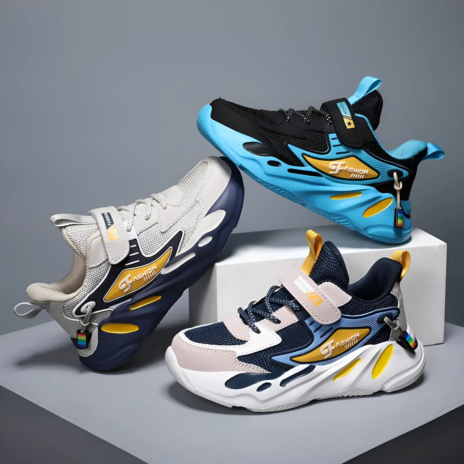 Boys dark blue and black Velcro sports running shoes with a breathable mesh upper