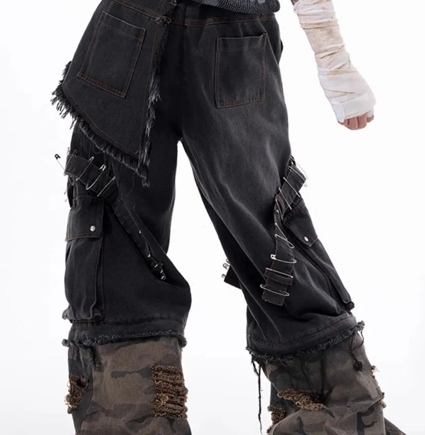 Men's grey jeans with camouflage pattern splicing and decorative pin and ribbon details on cotton denim