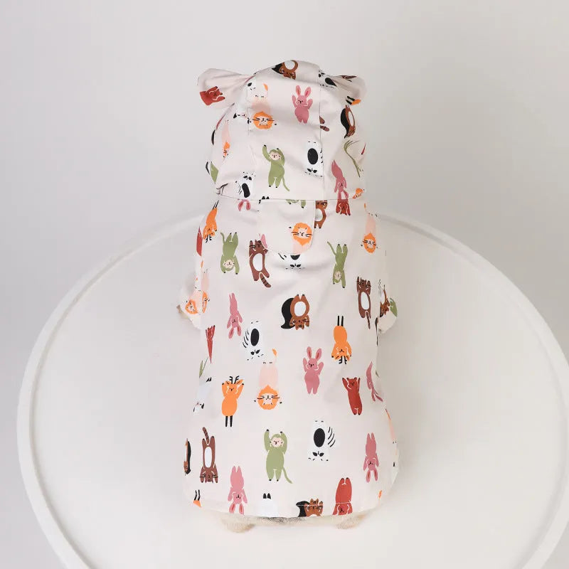 Beige dog raincoat with cartoon print, showing double waterproof PU coating and available in sizes S to XXL.