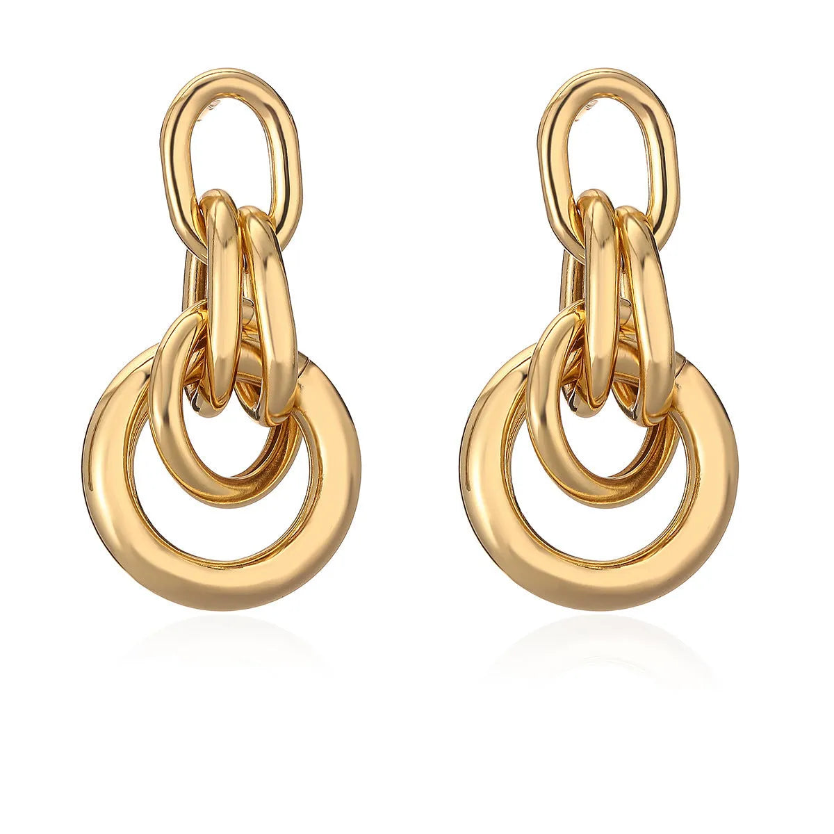 A pair of gold geometric earrings for women with an irregular shape, made from copper.