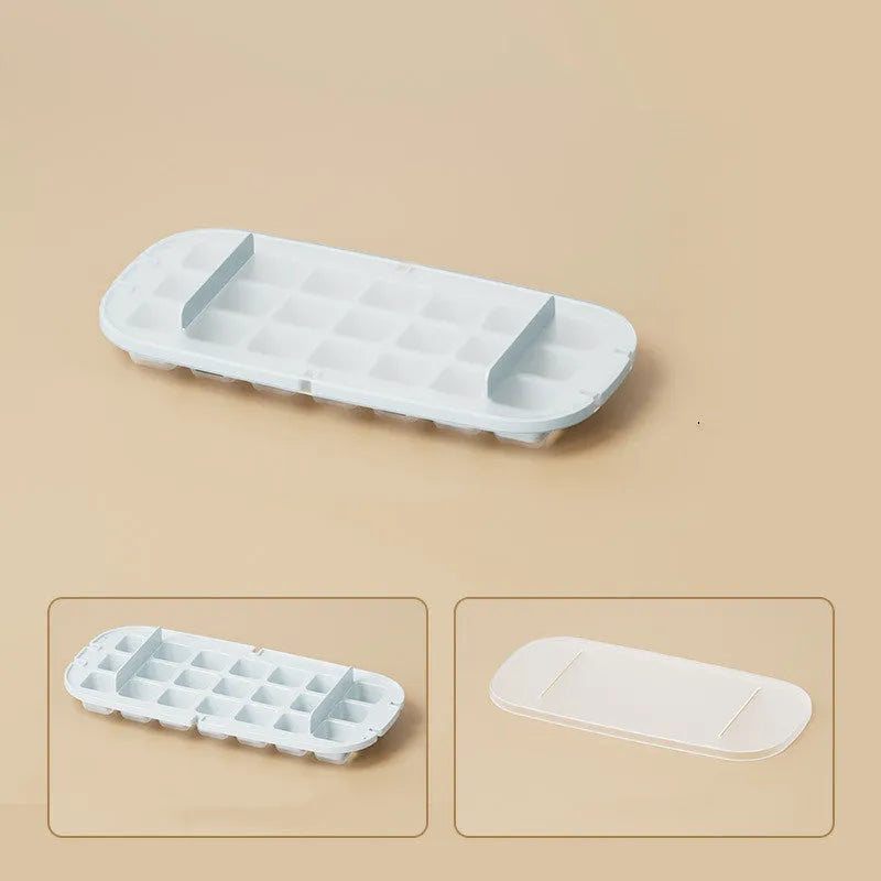 High capacity ice cube tray with grid design and integrated ice shovel storage compartment