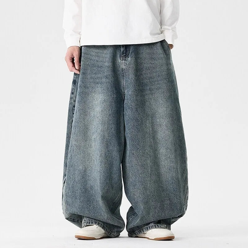 Men's plus size wide leg casual jeans in dark blue denim with straight leg opening