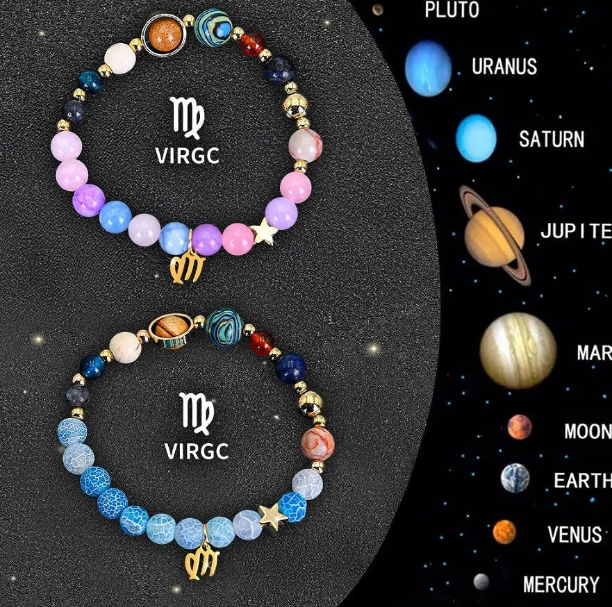Two natural stone beaded bracelets showing zodiac sign designs on a wooden surface.