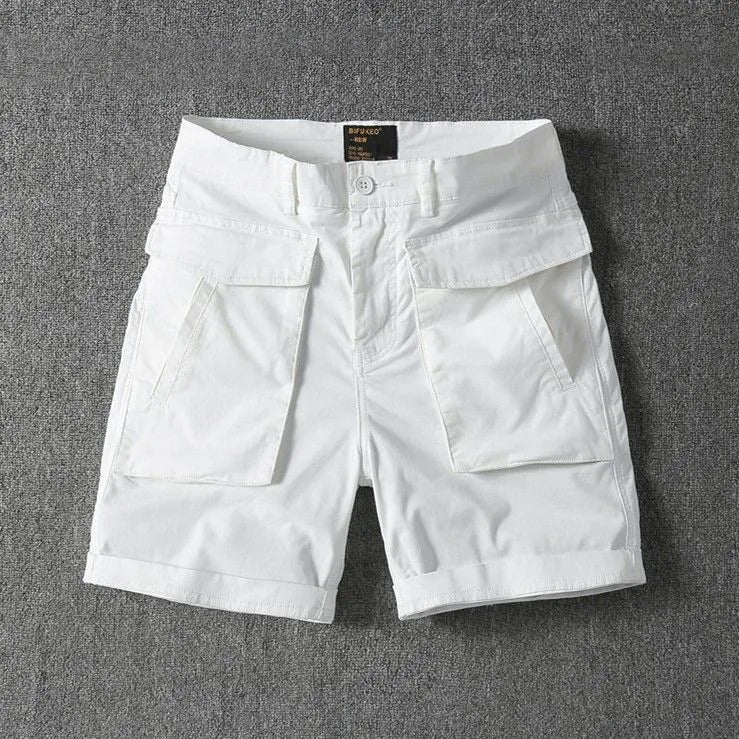 Men's cotton cargo shorts with stretch fabric in khaki colour, showing multiple pockets and straight-leg cut.