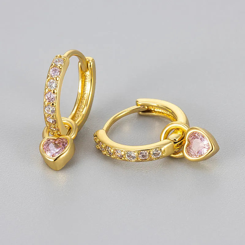 Women's zircon earrings with heart-shaped drops in gold or white gold settings with coloured gemstones