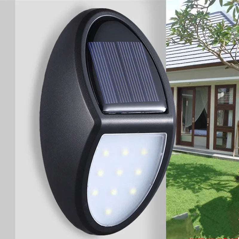 Black LED solar wall light with automatic light sensor measuring 75mm by 120mm