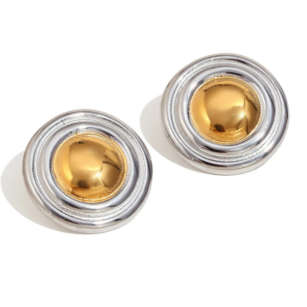 Gold geometric stainless steel earrings, bracelet, and necklace set on a white background.