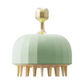Green pet bath massage brush with dual-sided head and drain holes for dog and cat grooming