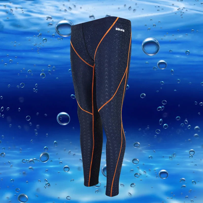 Men's black nylon cropped swimming trunks with green line detail for swimming and sports