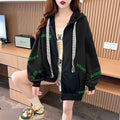 Loose large letter hooded cardigan coat for women in apricot with black lettering, long sleeves, and relaxed fit