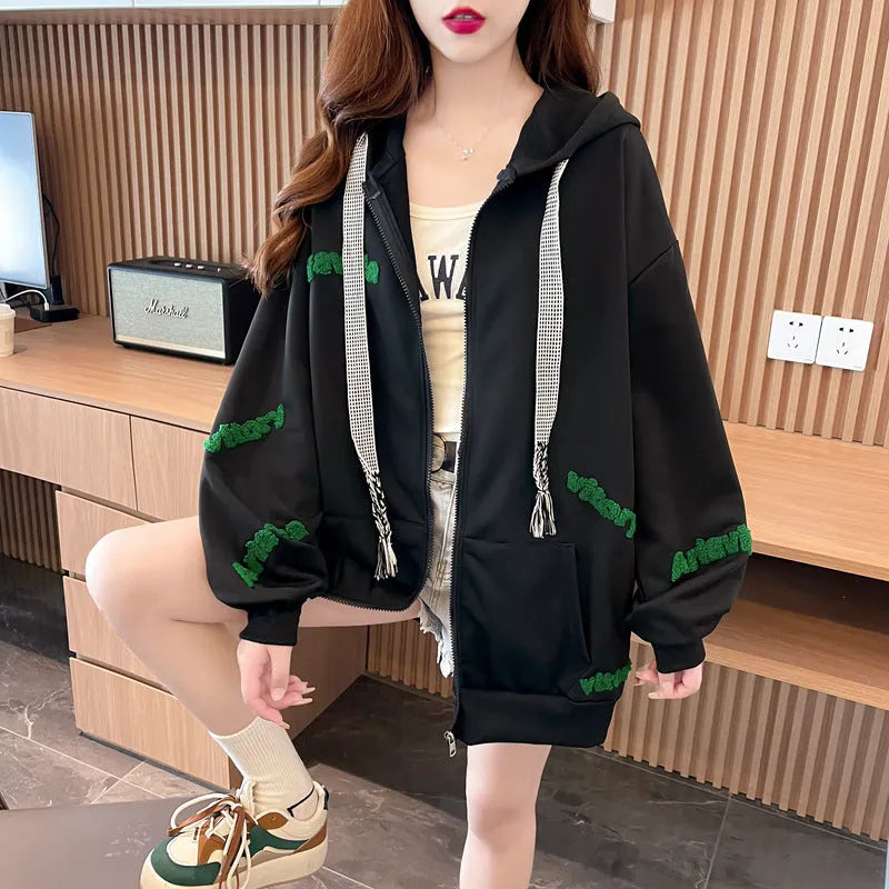 Loose large letter hooded cardigan coat for women in apricot with black lettering, long sleeves, and relaxed fit