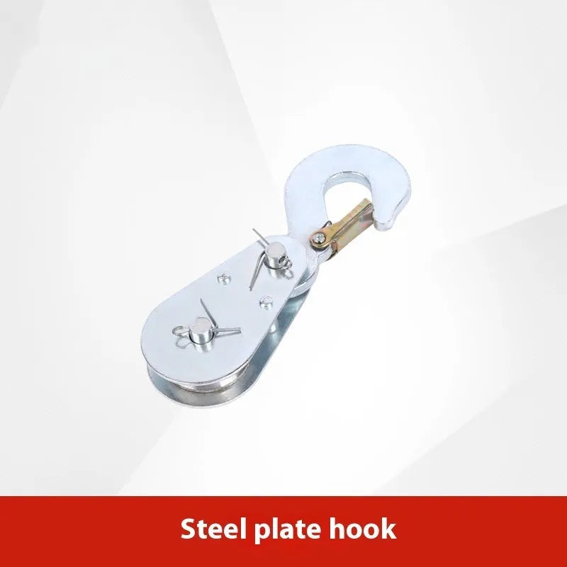 Red industrial steel lifting pulley with a safety latch on the hook.