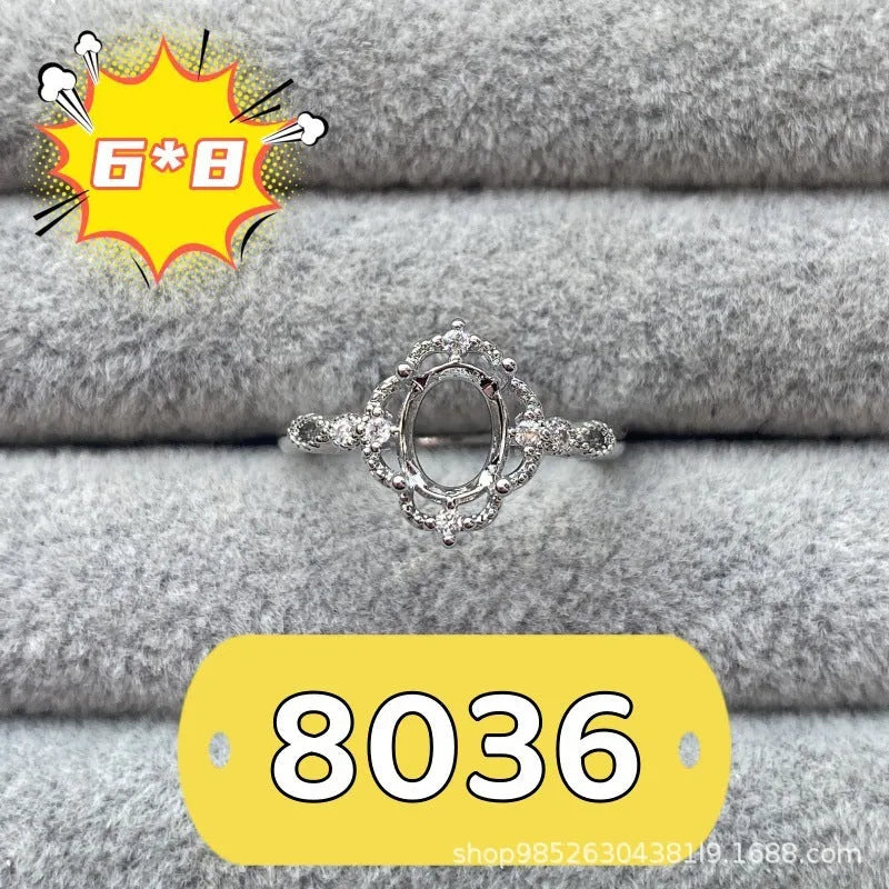 Oval denier open mouth ring with 6x8mm stone and five-pointed star on copper band.