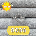 Oval denier open mouth ring with 6x8mm stone and five-pointed star on copper band.