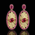 Gold-plated red corundum jewellery set showing necklace, ring and ear studs with diamond-cut water drop design