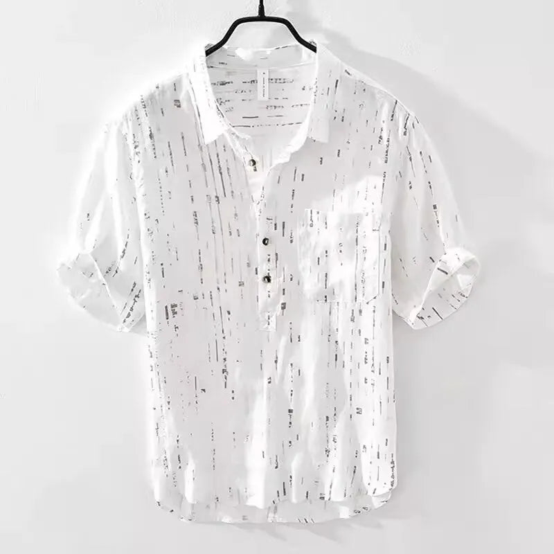 Men's loose fit black and white short sleeve polo shirt on a hanger