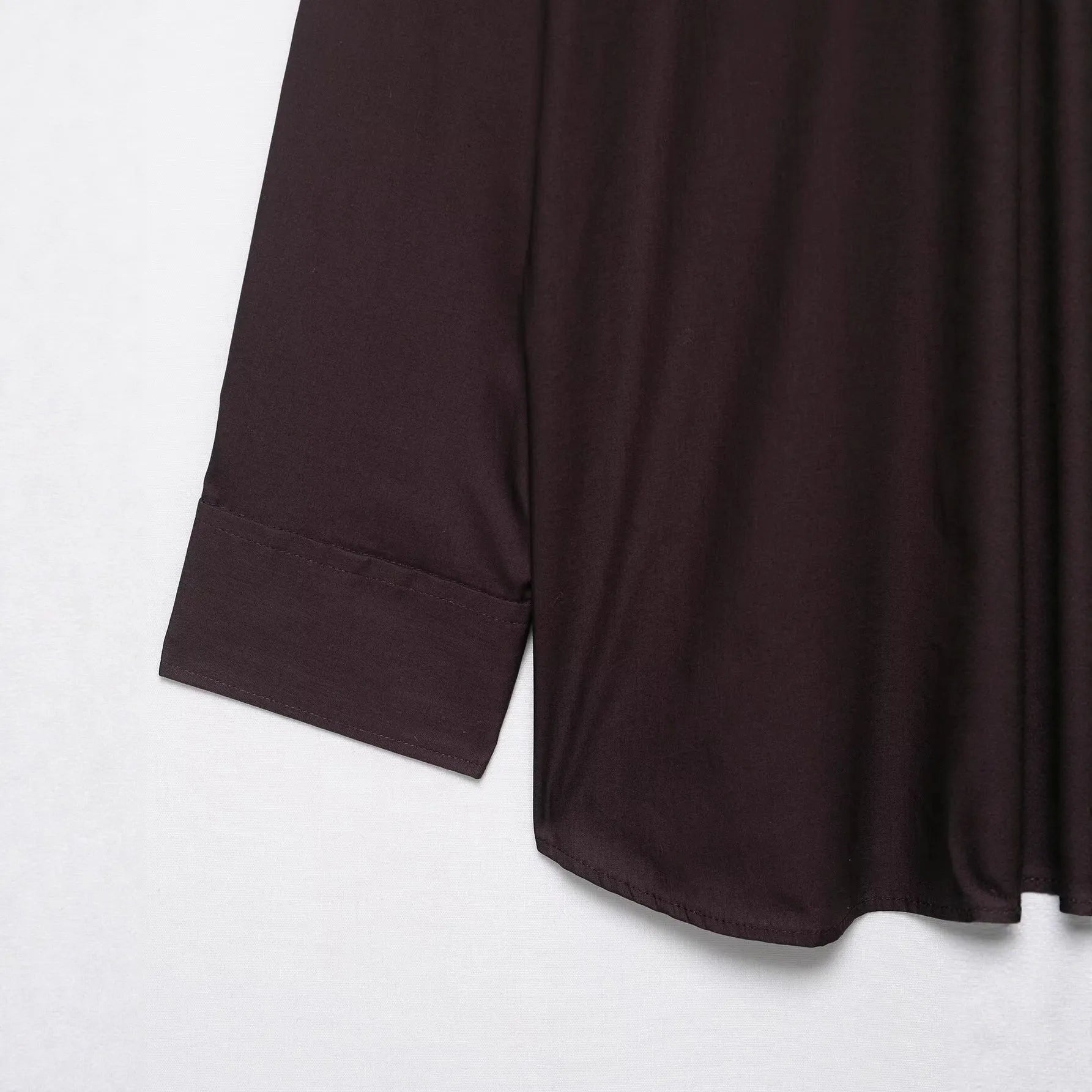 Brown loose-fit women's polyester poplin shirt with an attached bow tie, cardigan style.