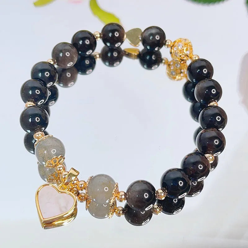Silver stone bracelet for women with electroplated finish showing flower, love heart and star charm options