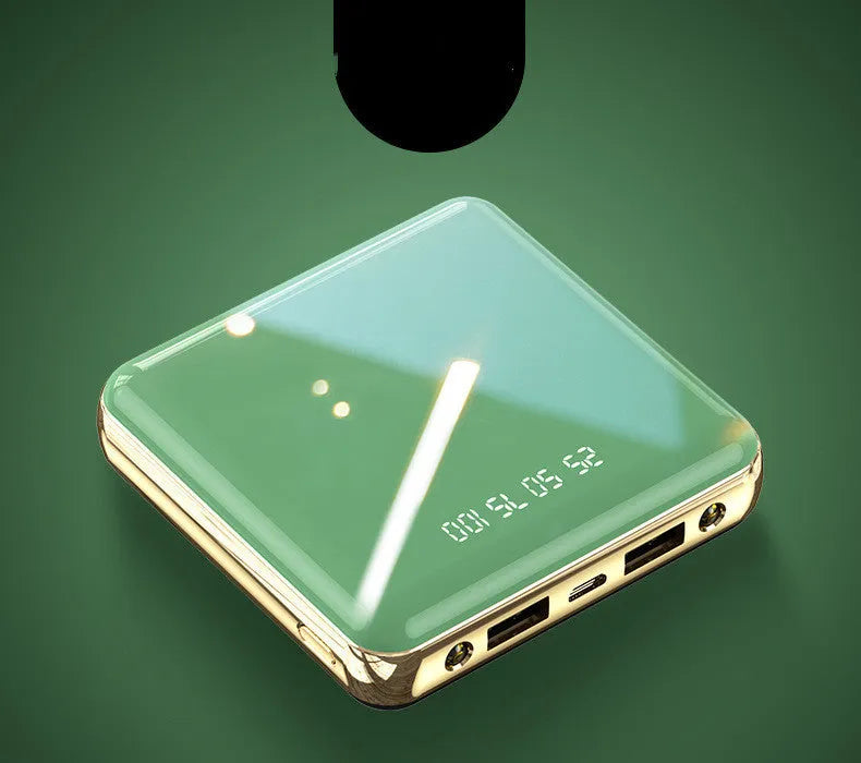 Compact blue portable power bank with 20000mAh capacity and multiple USB ports on a white background.