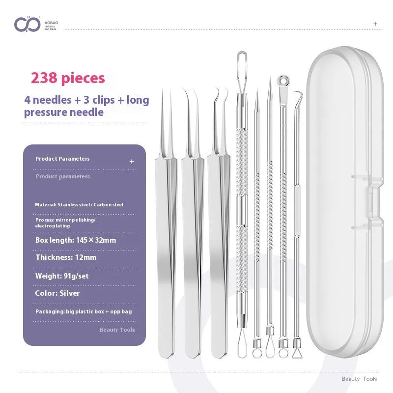 Four silver metal acne needles with fine pointed tips laid out on a flat surface.