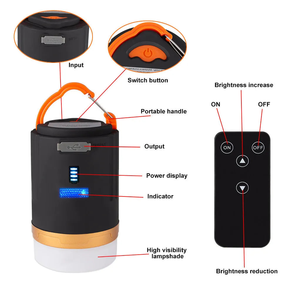 Black rechargeable LED camping light with hanging hook and remote control on a table