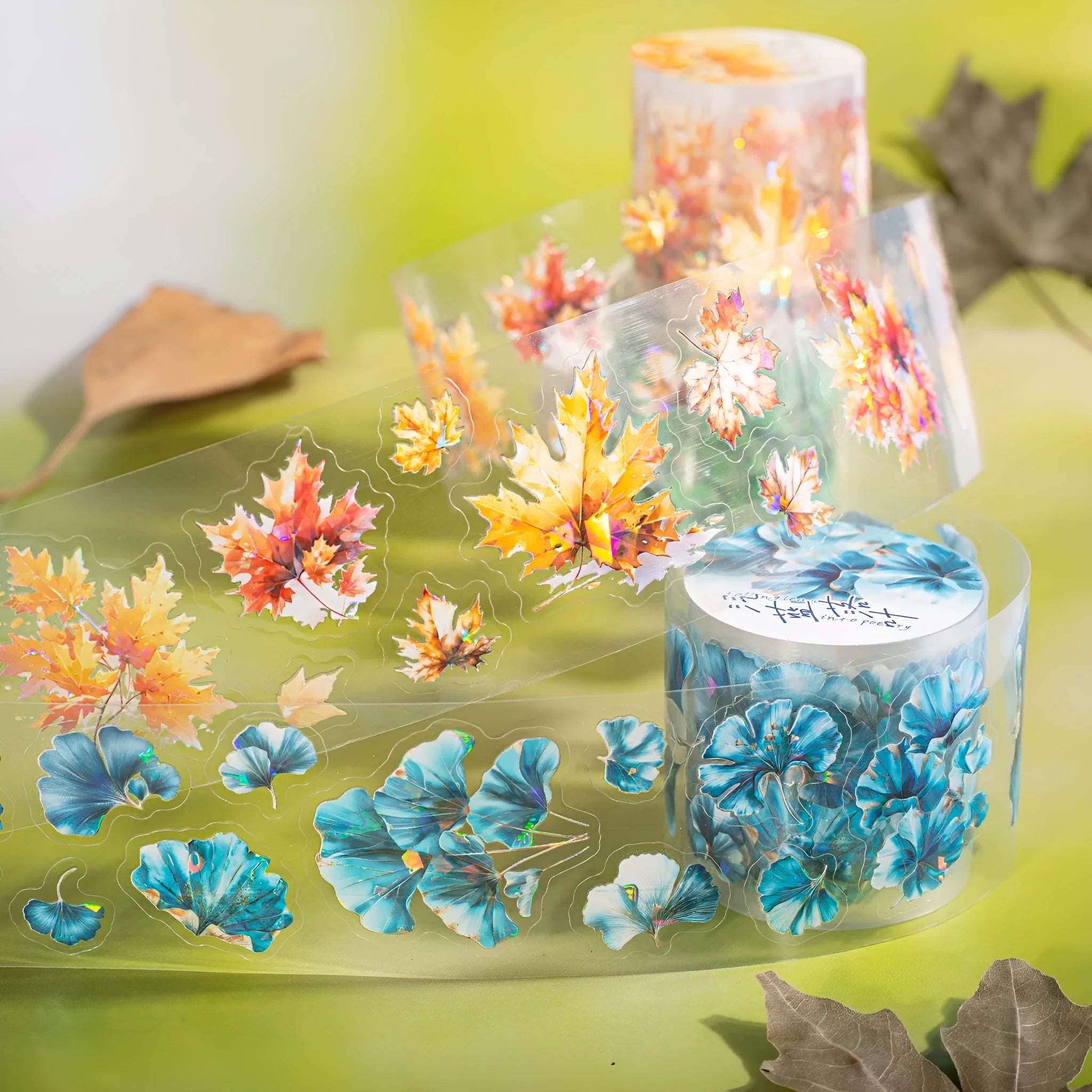 Roll of decorative leaf pattern stickers for hand account books showing six different natural designs including ginkgo and maple leaves