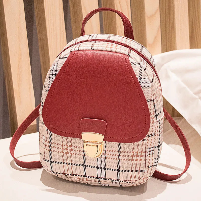 A one-shoulder diagonal phone bag made from PU fabric, shown in one of five colour options.