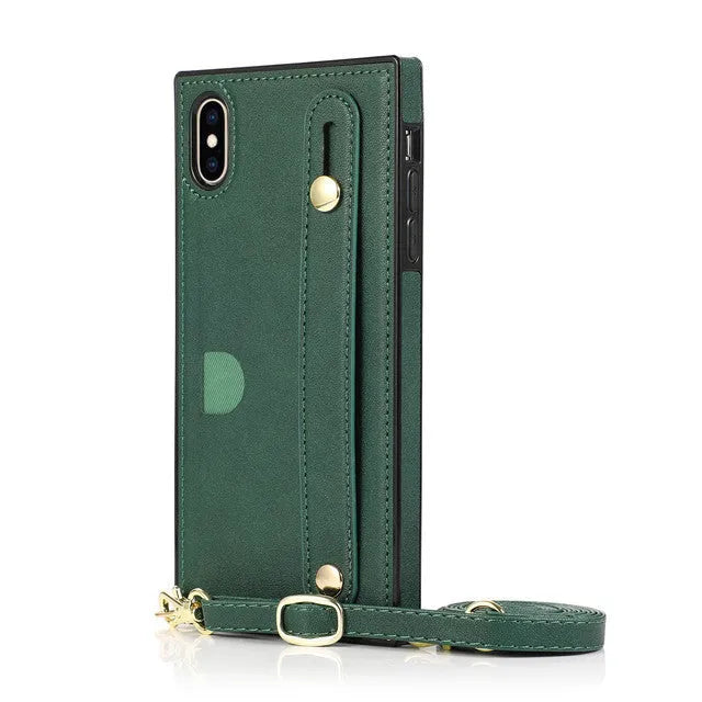 Black leather iPhone case with card holder slot and adjustable wristband holster attached.