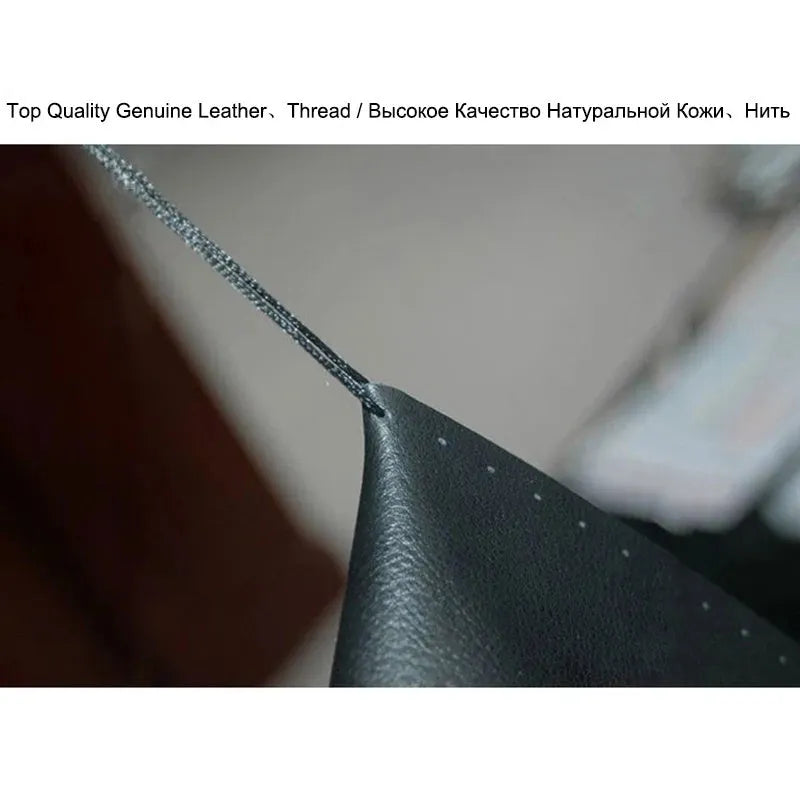 Hand-sewn genuine leather steering wheel cover in black for 38cm diameter steering wheel