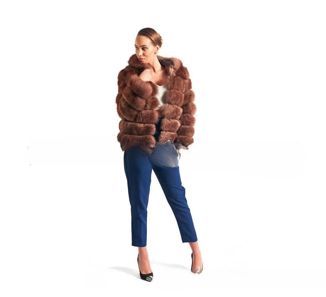 Loose-fitting hooded women's coat in artificial fur, shown in brown and white silver fox colours.