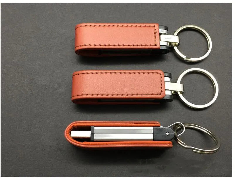 Leather USB flash drive with keychain ring, USB 2.0 interface, available in black, blue, brown, red, white, 16GB or 32GB