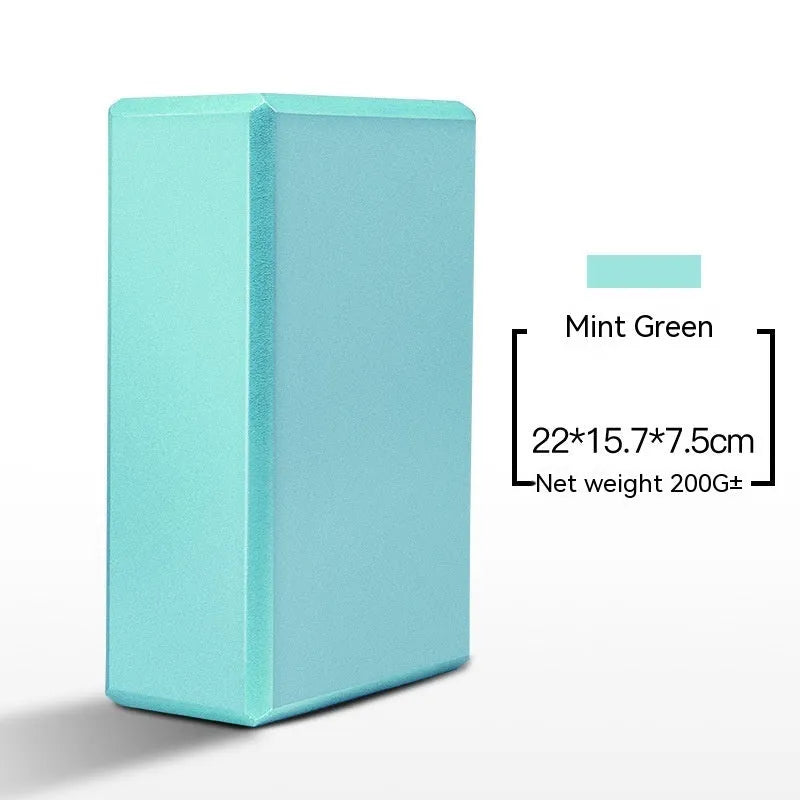 A high-density EVA yoga block in a choice of solid colours or printed designs, measuring 23cm by 15cm.
