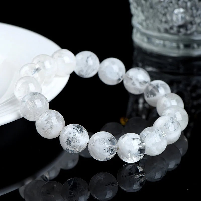 Women's crystal bracelet with natural blizzard snowflake round beads in geometric design with traditional elements