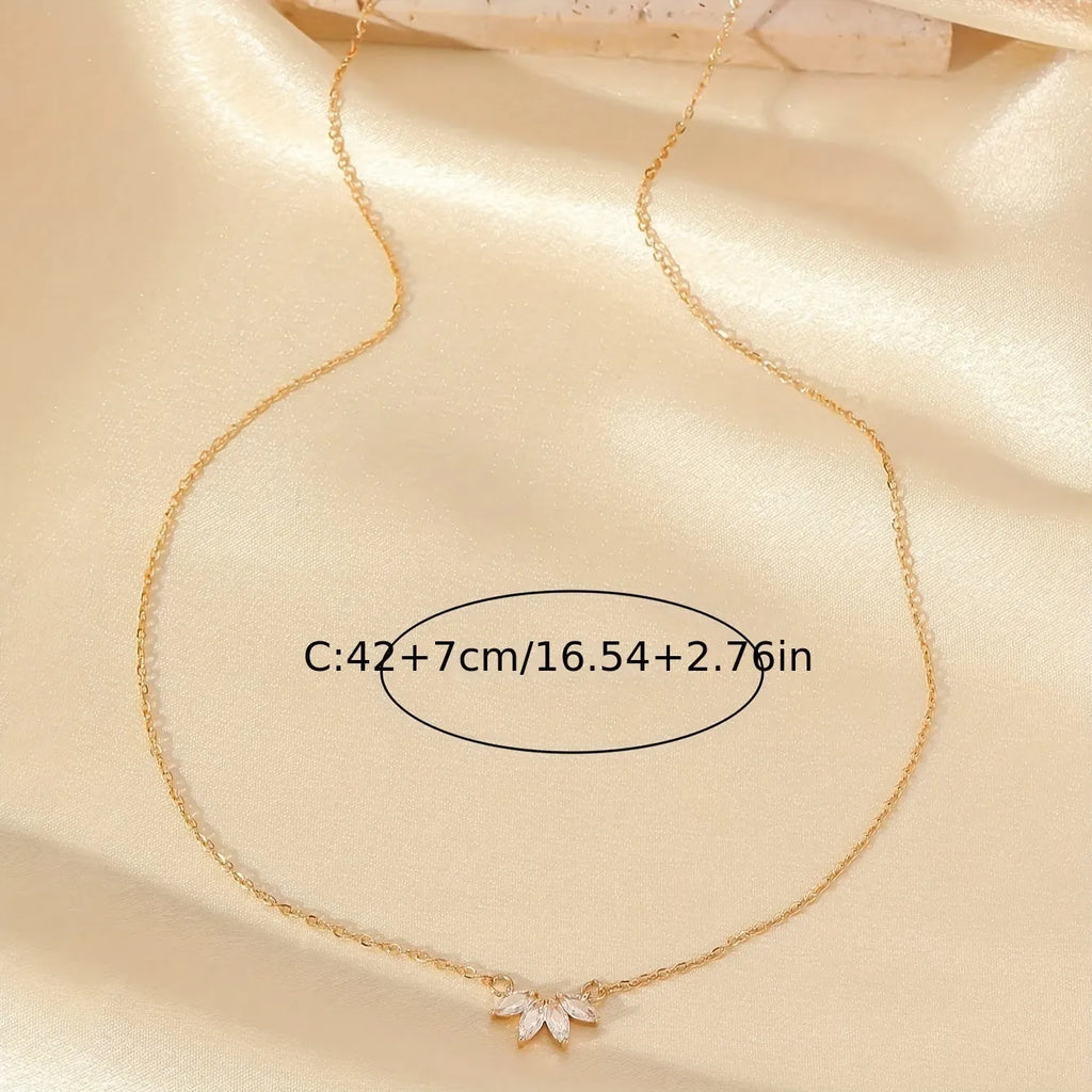 Rhinestone leaf necklace copper geometric pendant gold colour on display