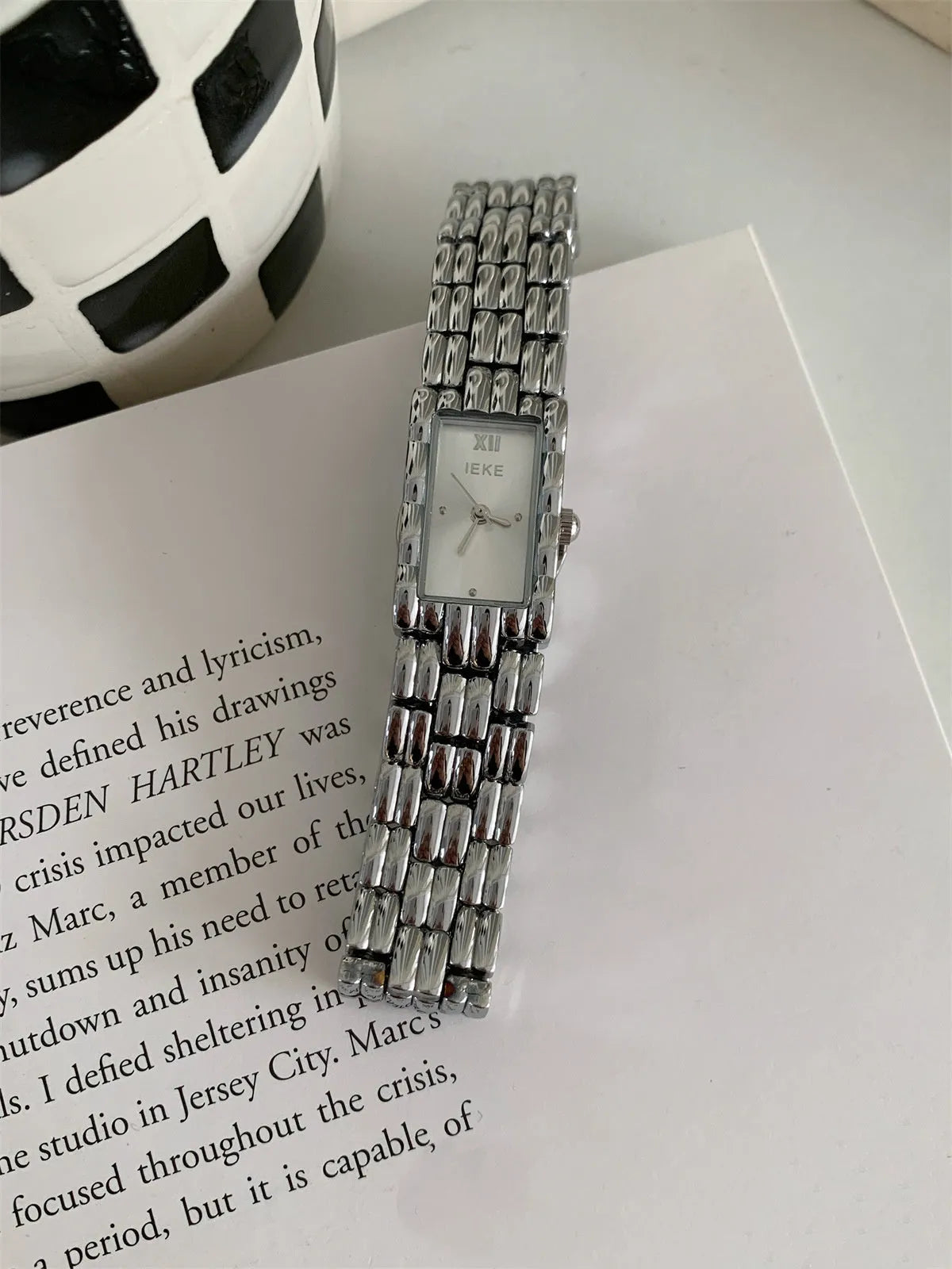 Women's Ins bracelet watch with 15mm dial, butterfly buckle, and silver or gold strap options.