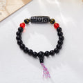 8mm agate Dzi bead bracelet with geometric shape and Tibetan-style beaded strap.