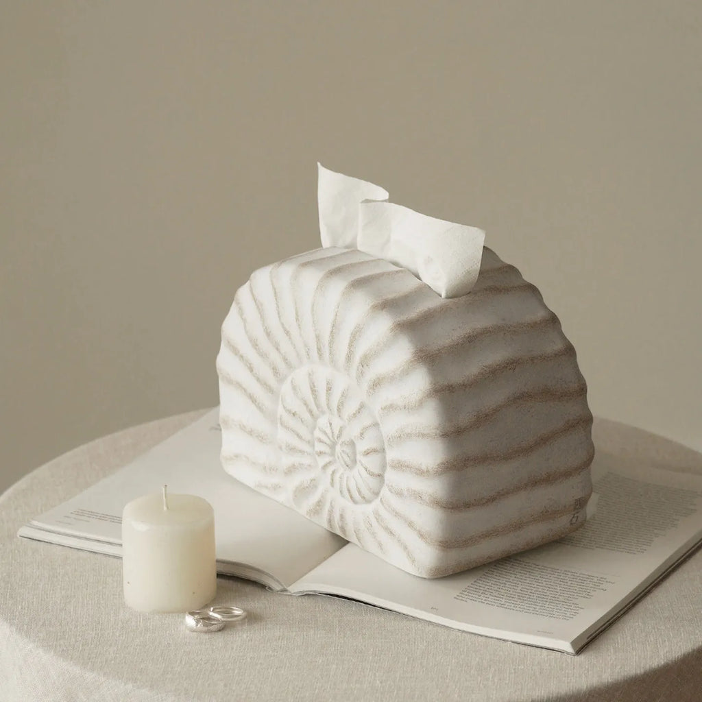 Conch ramble coloured resin decorative tissue box holder with a modern simple design.