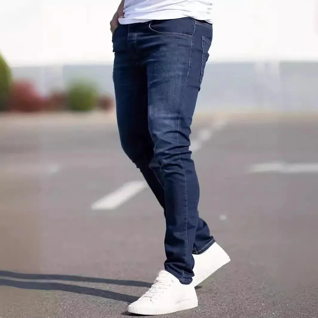 Men's dark blue slim fit cotton jeans with skinny style and mid-waist design