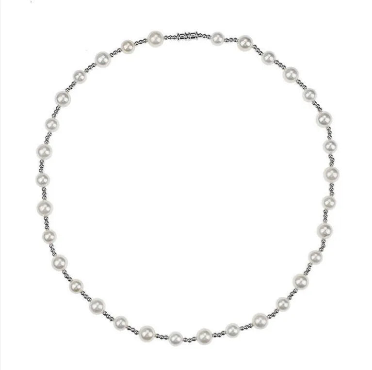 White freshwater pearl necklace with round bead chain and sterling silver platinum beads on a neutral background