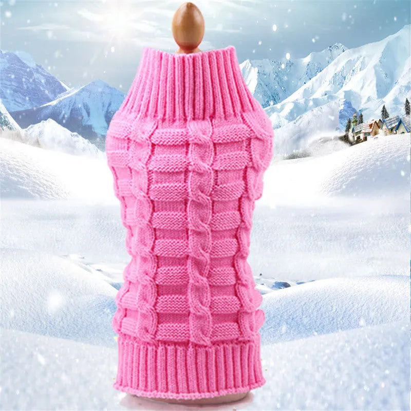 Twisted rope cashmere wool dog sweater in a V-neck style on a size chart showing measurements.