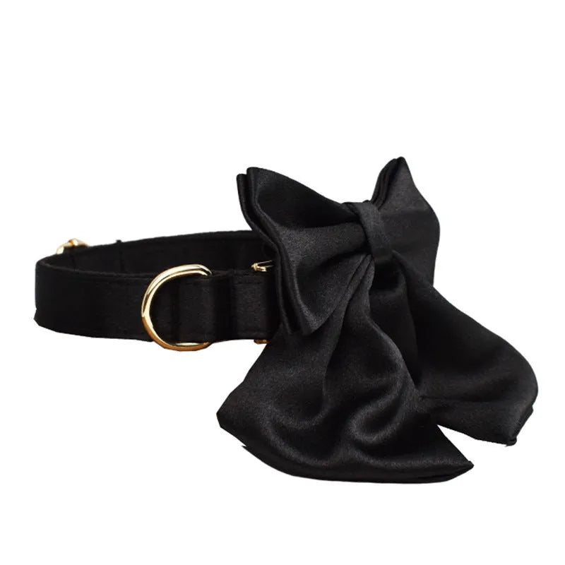 Cloth dog collar and leash set with chest strap, coordinating bow, and dog vest in multiple sizes.